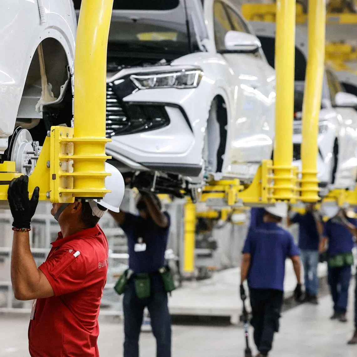 Electric vehicles being assembled at Chinese automaker BYD’s new factory in Bahia, Brazil. 