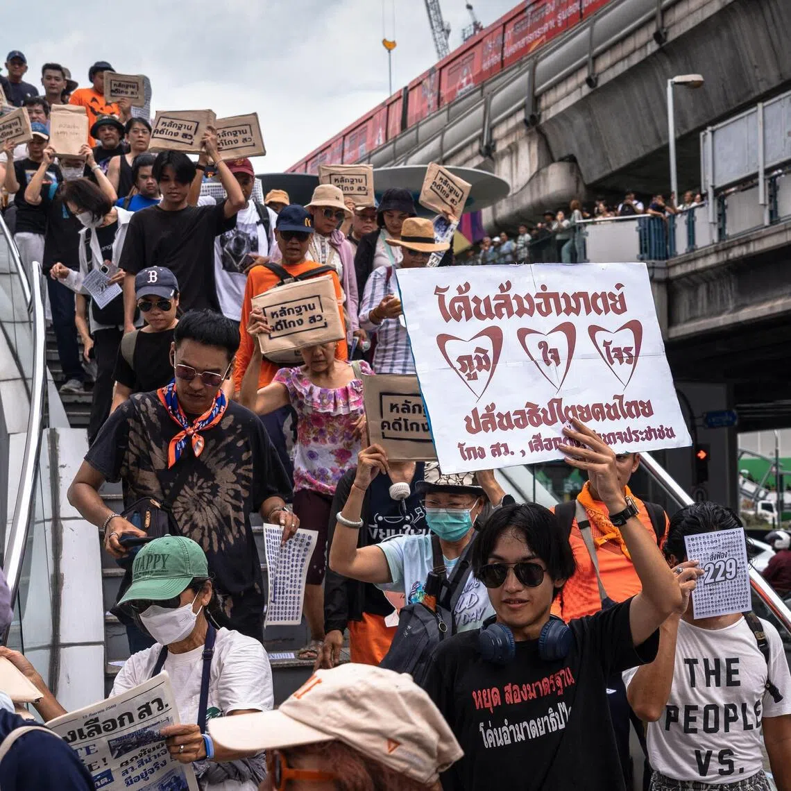 Hundreds of Thais marched through Bangkok on Sept 13, calling for the indictment of the 229 in a protest organised by accountability watchdog iLaw.