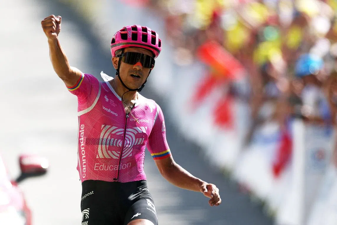 EF Education-EasyPost’s Richard Carapaz celebrates as he crosses the finish line to win Stage 18.