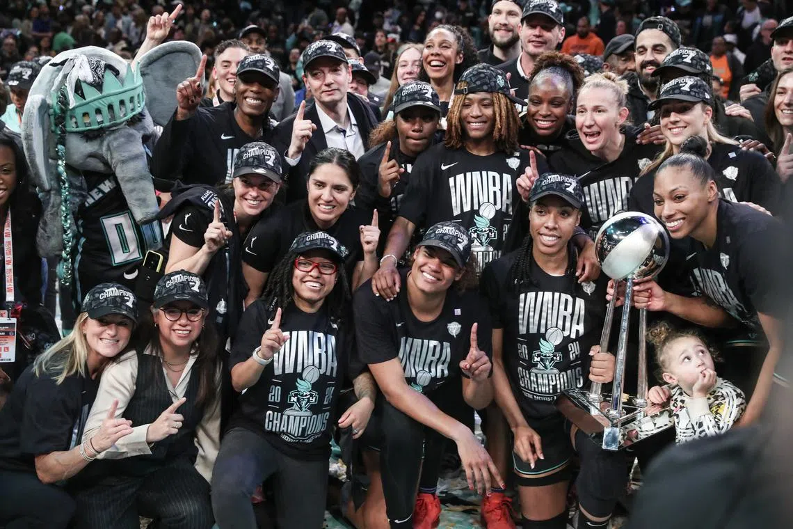 FILE PHOTO: Oct 20, 2024; Brooklyn, New York, USA; The New York Liberty celebrate after defeating the Minnesota Lynx in overtime to win the 2024 WNBA Finals at Barclays Center. Mandatory Credit: Wendell Cruz-Imagn Images/File Photo