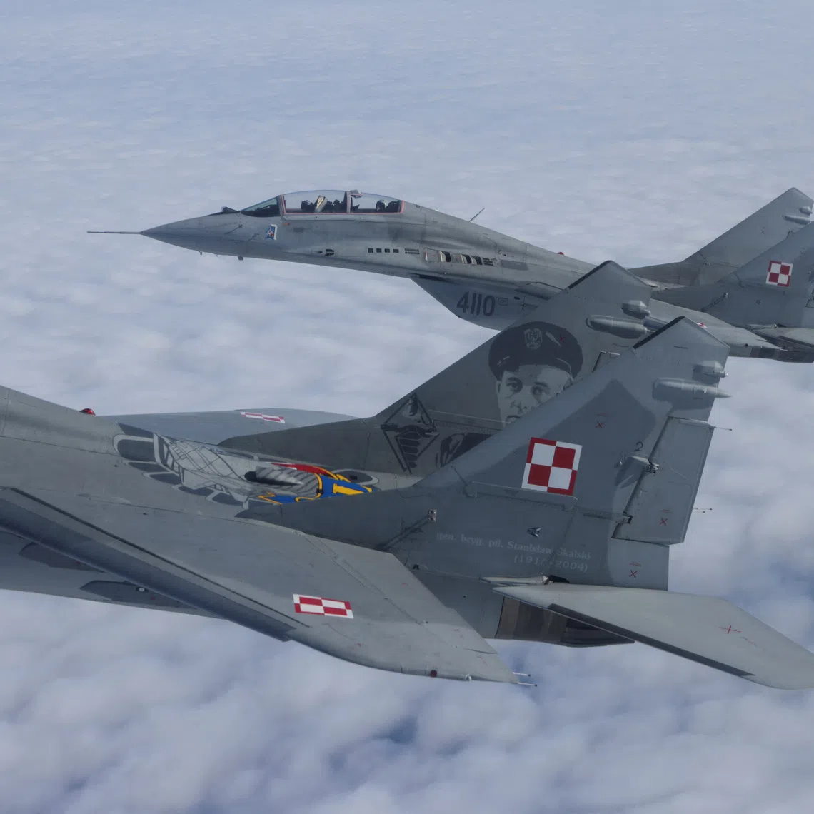 FILE PHOTO: MiG-29 aircrafts fly during a NATO media event at an airbase in Malbork, Poland, March 21, 2023. REUTERS/Lukasz Glowala/File Photo