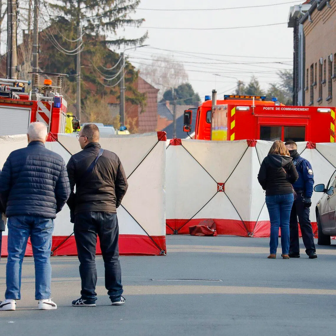 A cordoned-off scene in Strepy Bracquegnies, Belgium, on March 20, 2022, where six people died after a car ploughed into a carnival procession. Another victim died later.