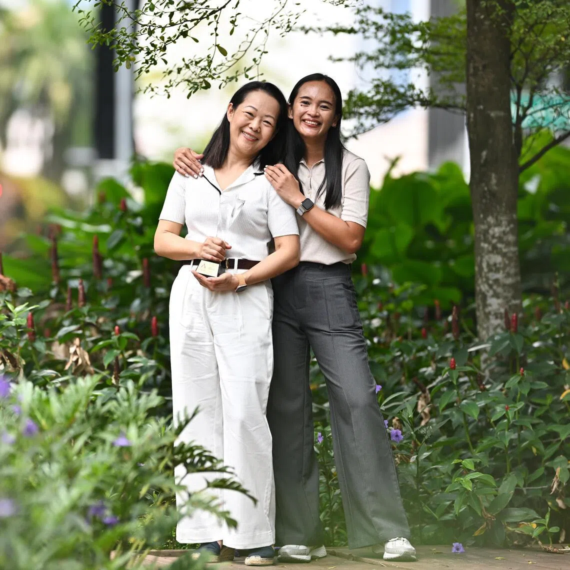 Madam Jamie Too (left), who received the Employer of the Year Award 2026, encouraged her domestic worker Ms Ika Septia Purnamasari to pursue higher education and funded part of it.