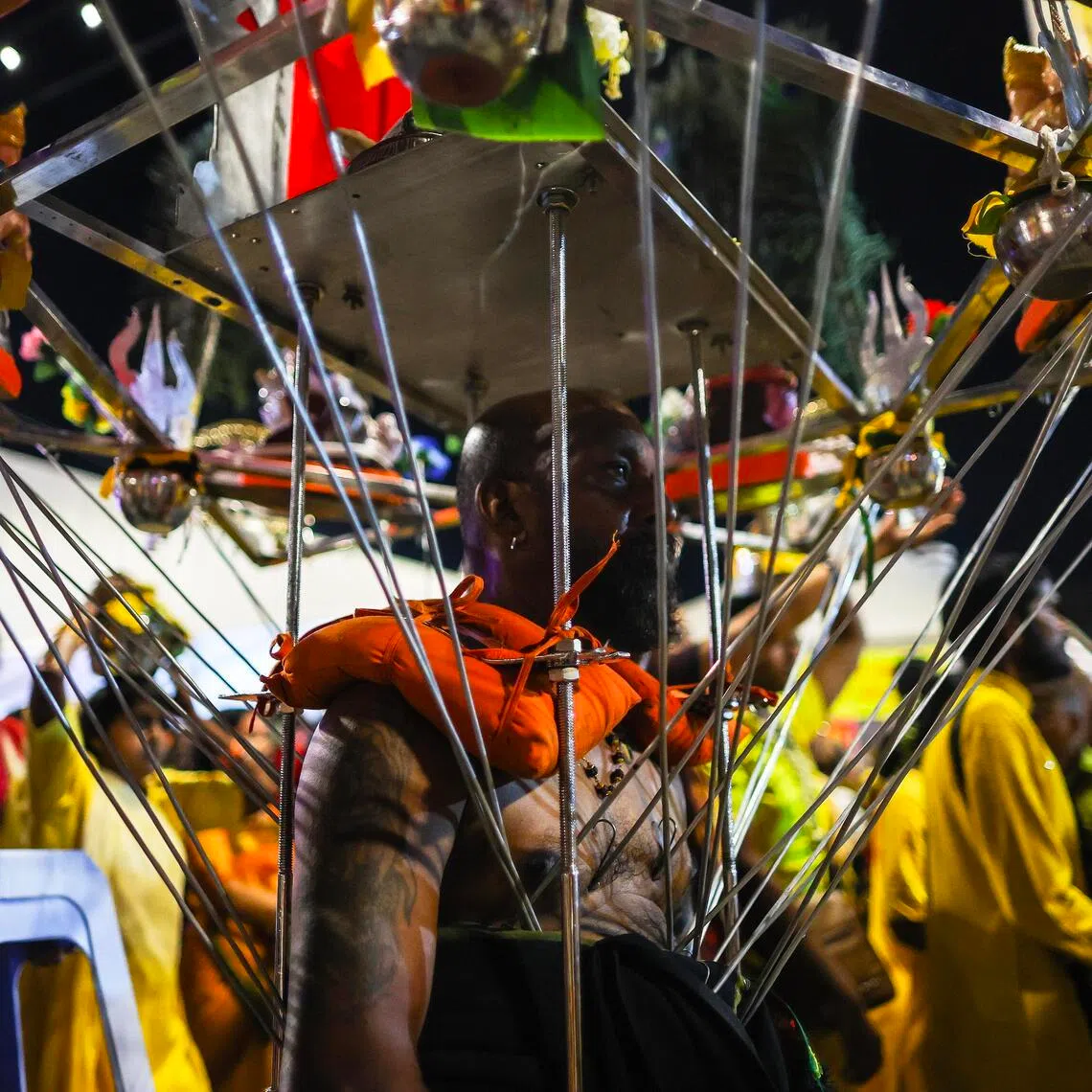 A Hindu devotee carries the 'Kavadi' during a procession at the Thaipusam Festival, in Kuala Lumpur.