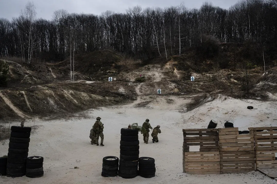 Ukrainian soldiers at a firing range outside of Kharkiv on Jan 21, 2023.