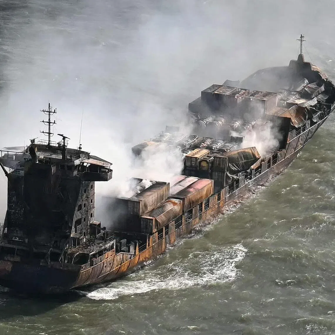 Smoke rising from the MV Solong cargo ship in the North Sea on March 11, after it collided with the MV Stena Immaculate tanker a day earlier. 