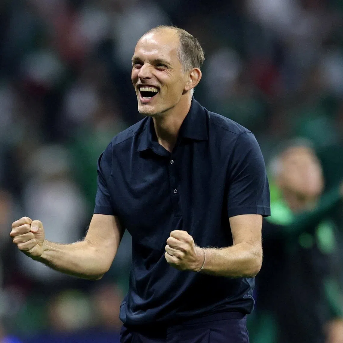 Soccer Football - FIFA World Cup 2026 - Round of 16 - Mexico v England - Estadio Azteca, Mexico City, Mexico - July 5, 2026 England manager Thomas Tuchel celebrates after the match REUTERS/Paul Childs