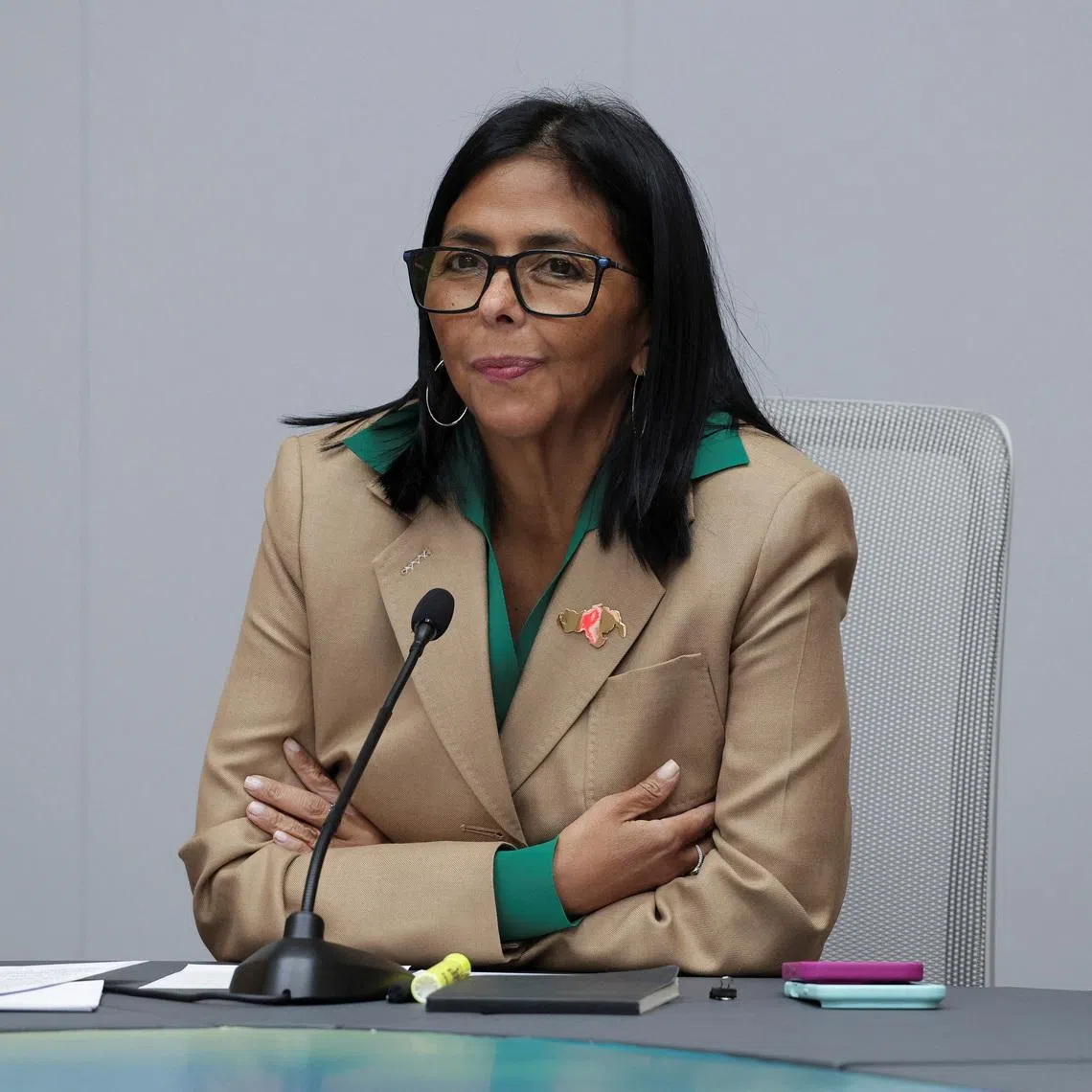 Venezuela's acting President Delcy Rodriguez attends a meeting with Colombia's Defense Minister Pedro Sanchez and Colombia's Foreign Minister Rosa Villavicencio after a planned meeting between Colombian President Gustavo Petro and Rodriguez was postponed, at Miraflores Palace in Caracas, Venezuela, March 13, 2026. REUTERS/Gaby Oraa