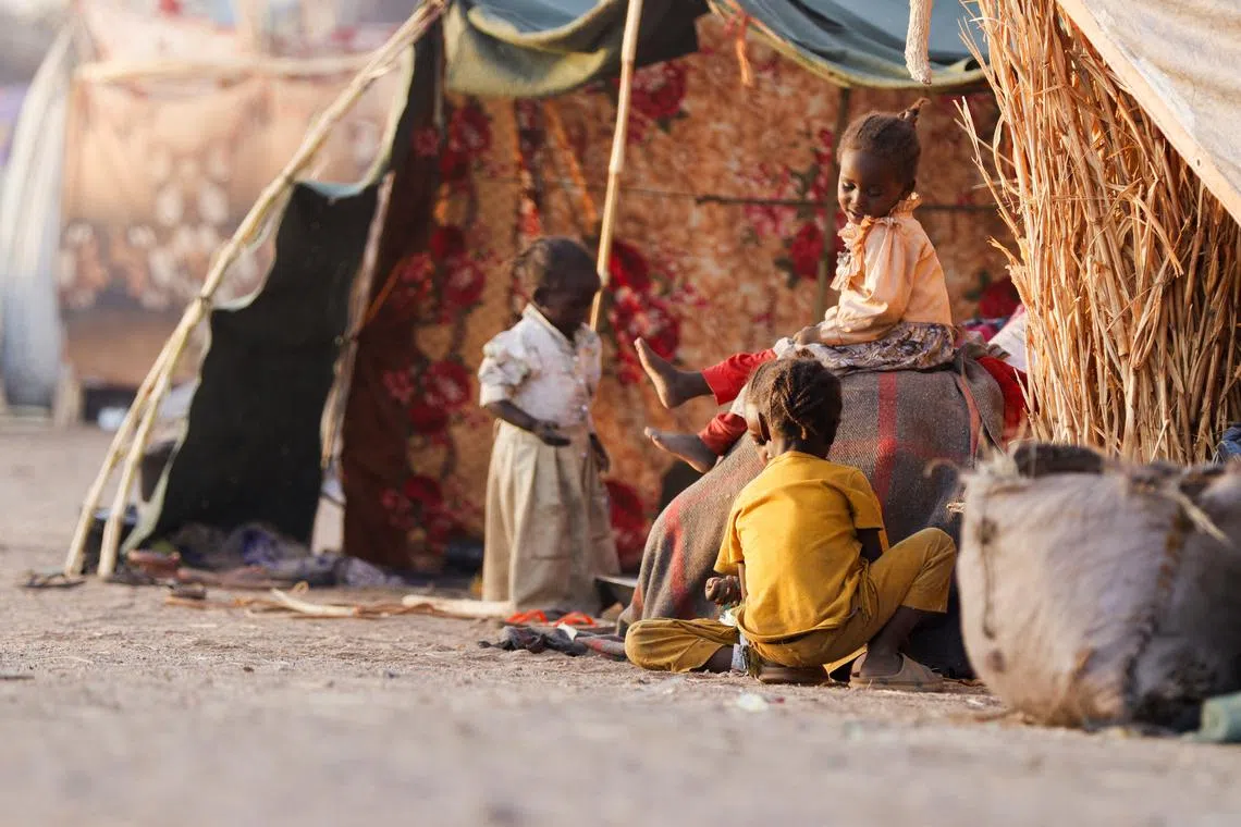 FILE PHOTO: Displaced children play, following Rapid Support Forces (RSF) attacks on Zamzam displacement camp, as they shelter in the town of Tawila, North Darfur, Sudan April 16, 2025. REUTERS/Stringer/File Photo