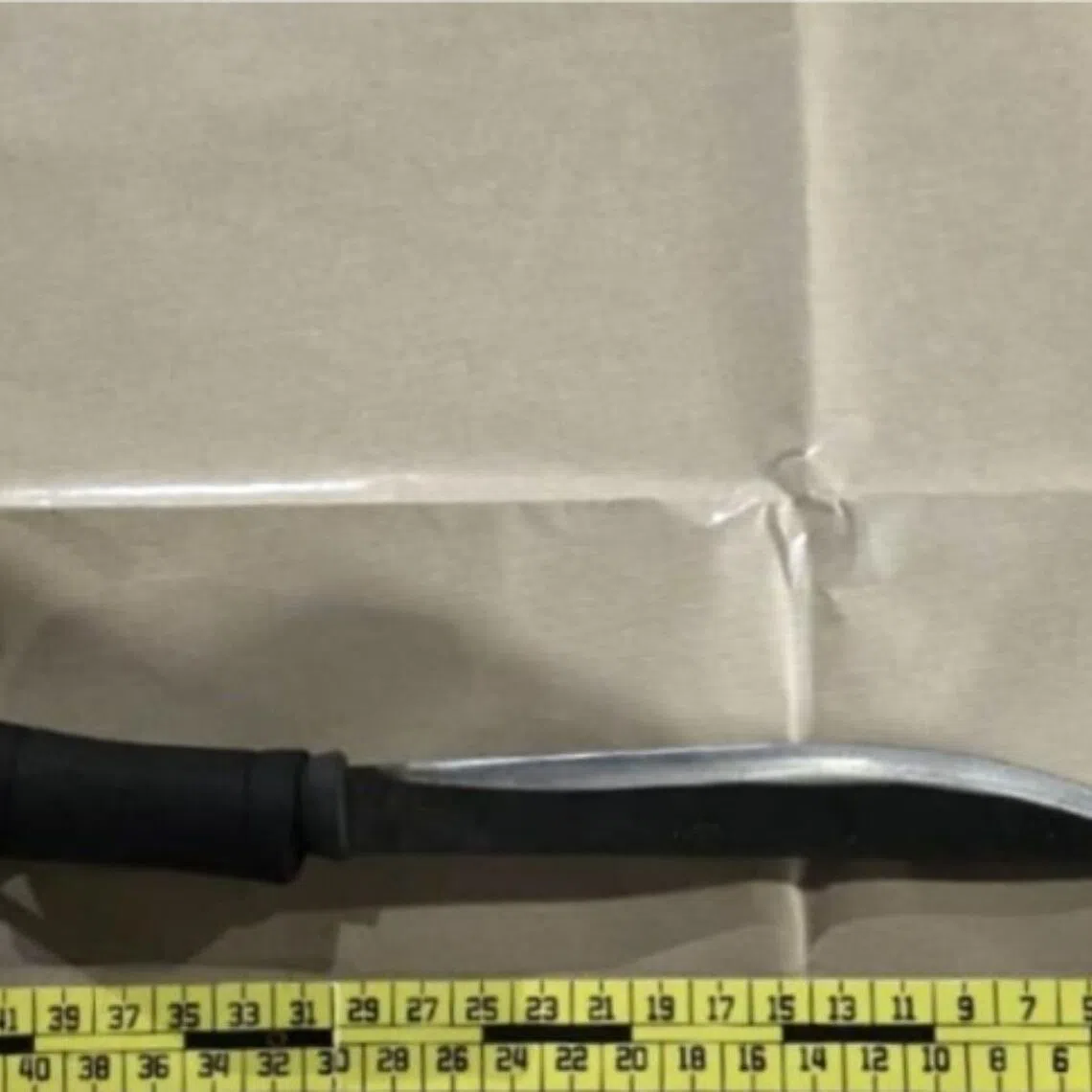 A parang was recovered from a 38-year-old man, who used the weapon to threaten the victim.