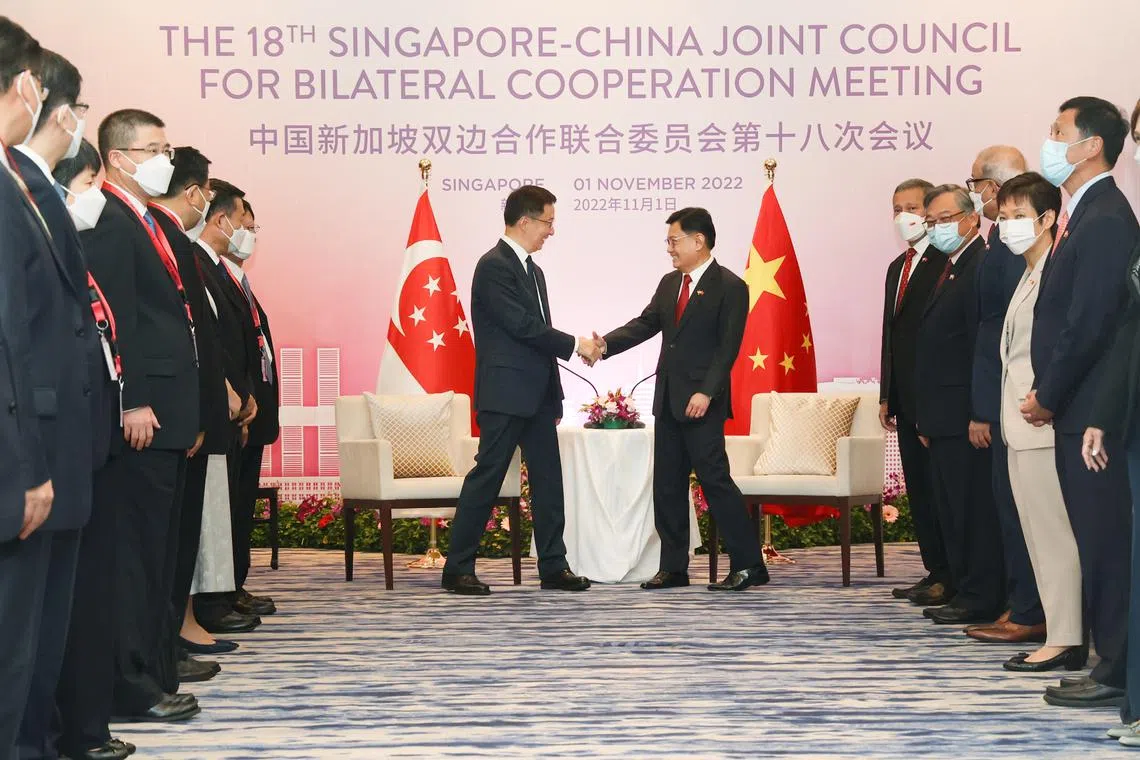 Chinese Vice-Premier Han Zheng (left) and Deputy Prime Minister Heng Swee Keat meet at the Four Seasons Hotel on Tuesday.