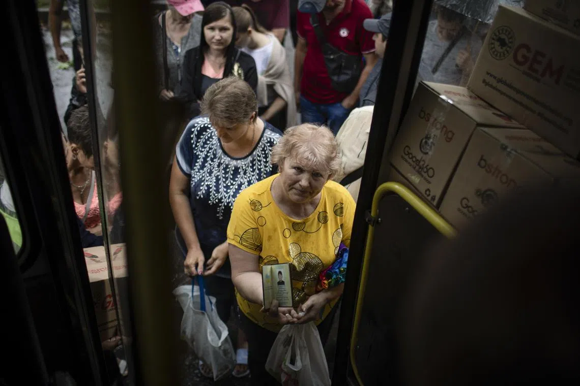 Ukrainians in areas under Russian control have no choice but to accept a Russian passport if they want to survive, say researchers.