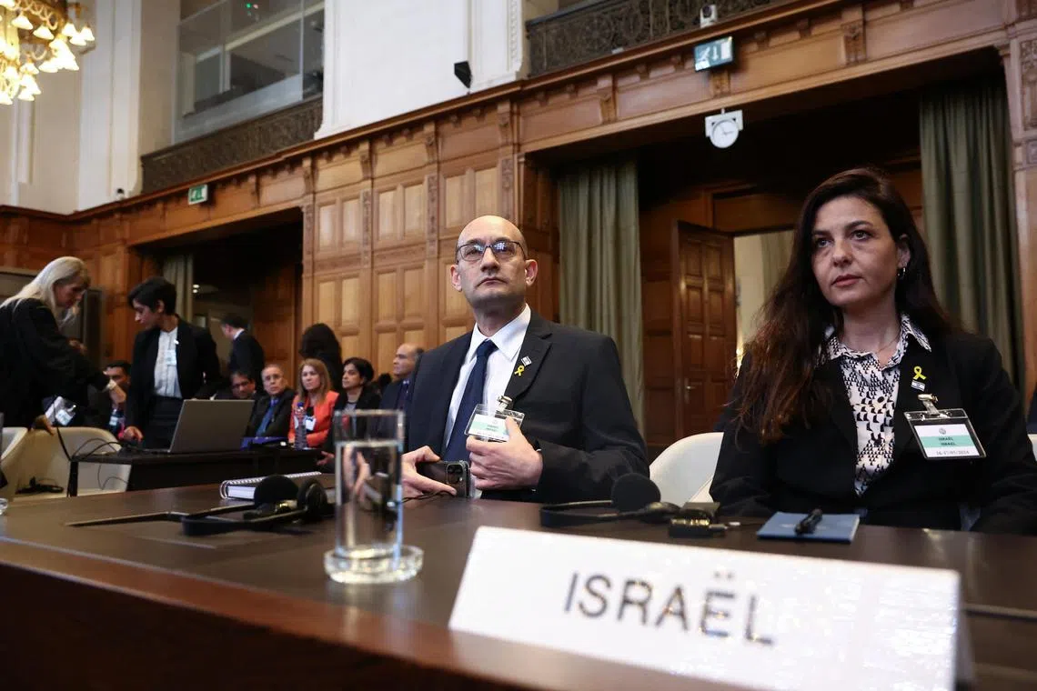 Deputy Attorney General for International Law Gilad Noam and Principal Deputy Legal Adviser of the Ministry of Foreign Affairs of Israel Tamar Kaplan Tourgeman look on at the International Court of Justice (ICJ), at the start of a hearing where South Africa requests new emergency measures over Israel's attacks on Rafah, as part of an ongoing case South Africa filed at the ICJ in December last year accusing Israel of violating the Genocide Convention during its offensive against Palestinians in Gaza, in The Hague Netherlands May 16, 2024. REUTERS/Yves Herman
 