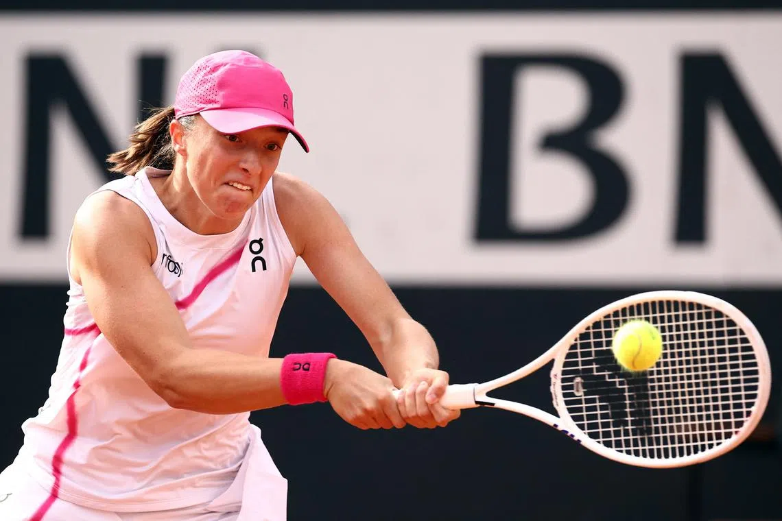 FILE PHOTO: Tennis - Italian Open - Foro Italico, Rome, Italy - May 18, 2024 Poland's Iga Swiatek in action during her final match against Belarus' Aryna Sabalenka REUTERS/Guglielmo Mangiapane/File Photo