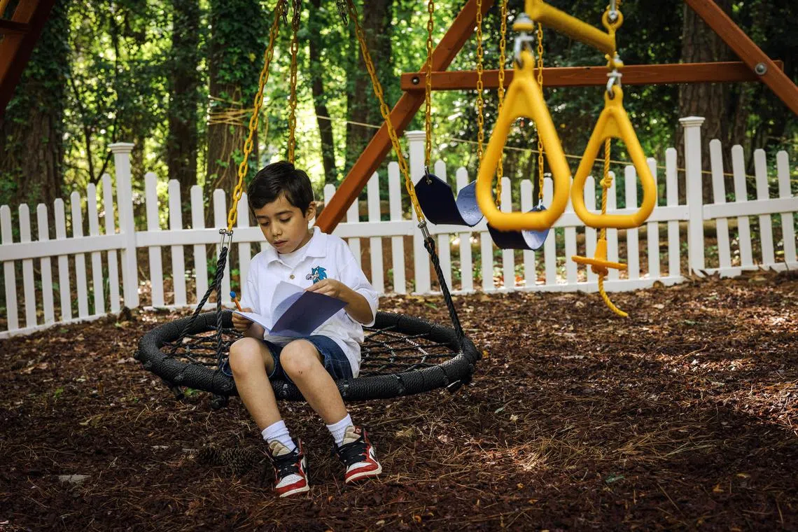 Nathanael works on a science assignment at his microschool, Kingdom Seed Christian Academy, which has six other students, in Snellville, Ga., April 19, 2024. Parents, desperate for help, are turning to private schools with a half-dozen or so students, and they are getting a financial boost from taxpayers. (Audra Melton/The New York Times) 