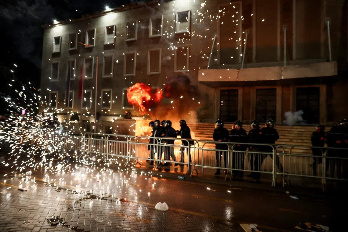 Police members operate during an anti-government protest, triggered by a corruption investigation into Deputy Prime Minister Belinda Balluku, in front of the Prime Minister's office in Tirana, Albania, February 10, 2026. REUTERS/Florion Goga