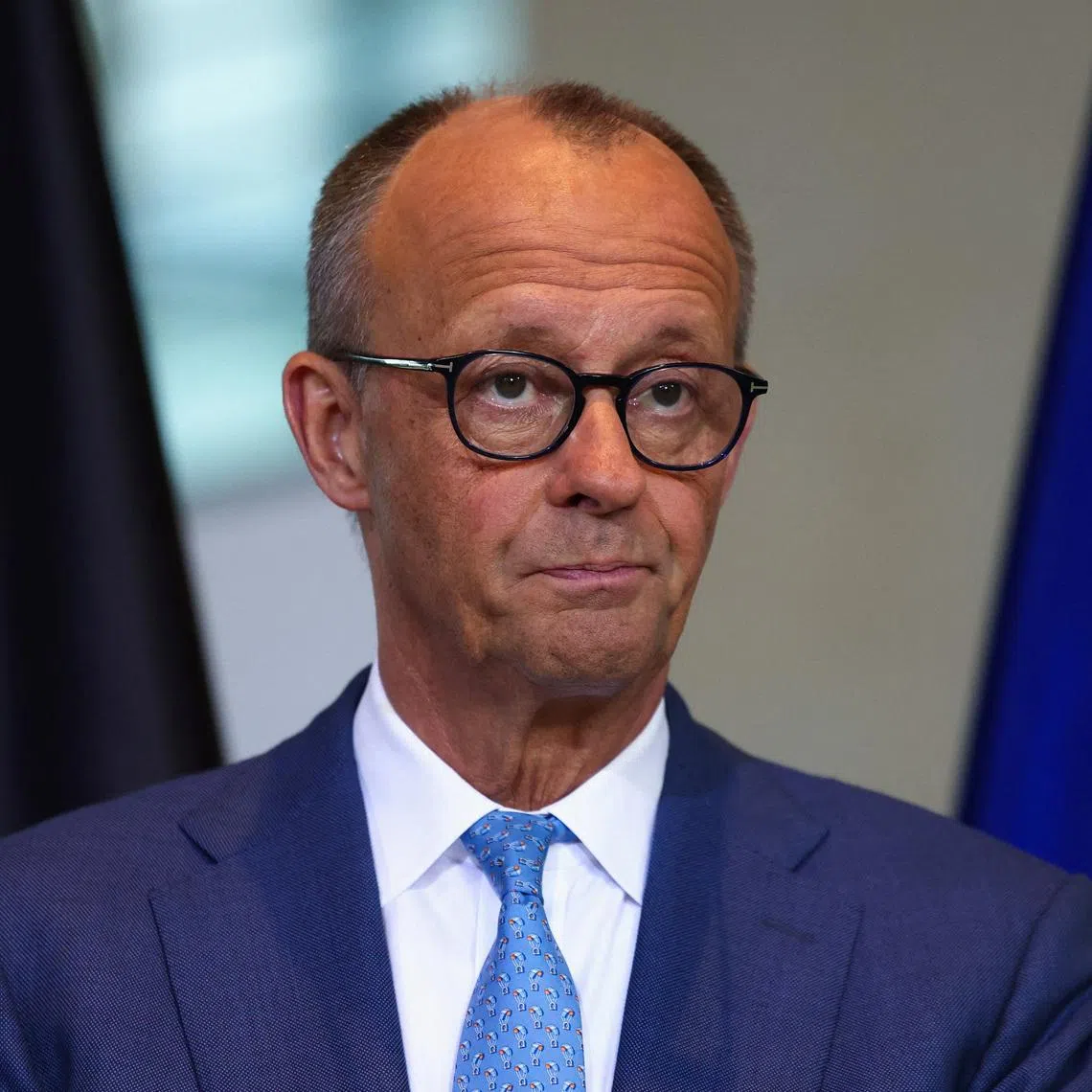 German Chancellor Friedrich Merz attends a press conference with Portuguese Prime Minister Luis Montenegro (not pictured), in Berlin, Germany, May 5, 2026. REUTERS/Christian Mang