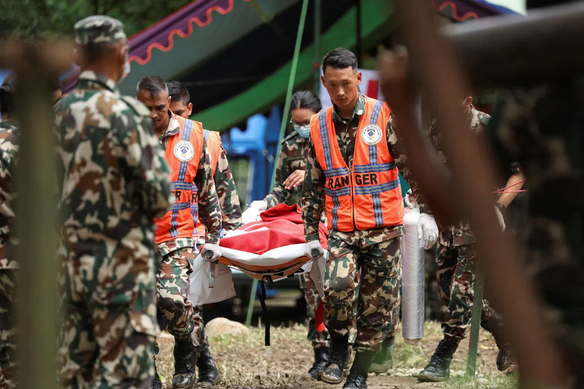 Two people pulled alive from Nepal hydropower tunnel