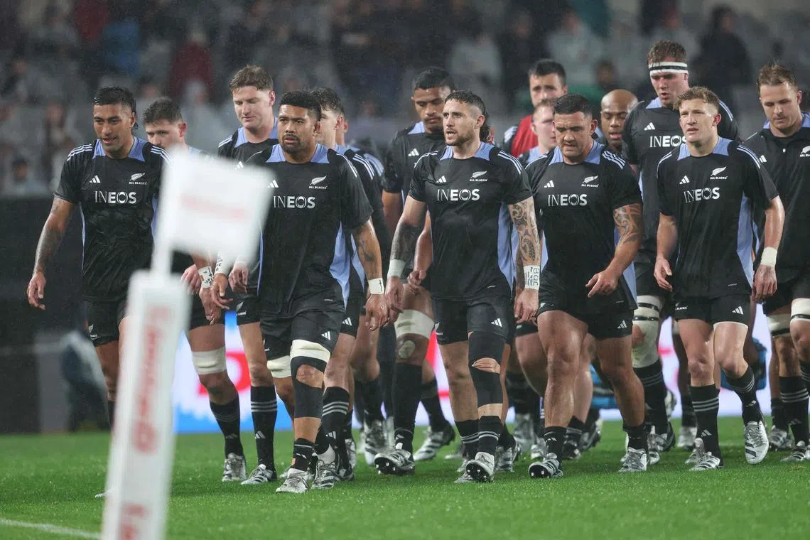 New Zealand's players gather during the Rugby Championship Test match between the New Zealand All Blacks and Argentina at Eden Park in Auckland on Aug 17, 2024.