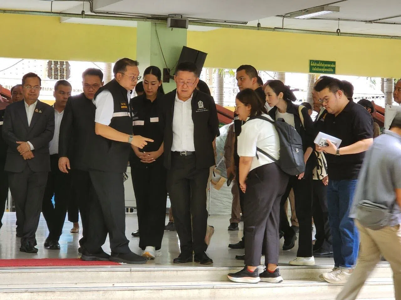 Education Minister Prasert Jantararuangtong visiting a hospital where victims of a mass shooting incident in Thailand on Aug 7 were receiving treatment.
