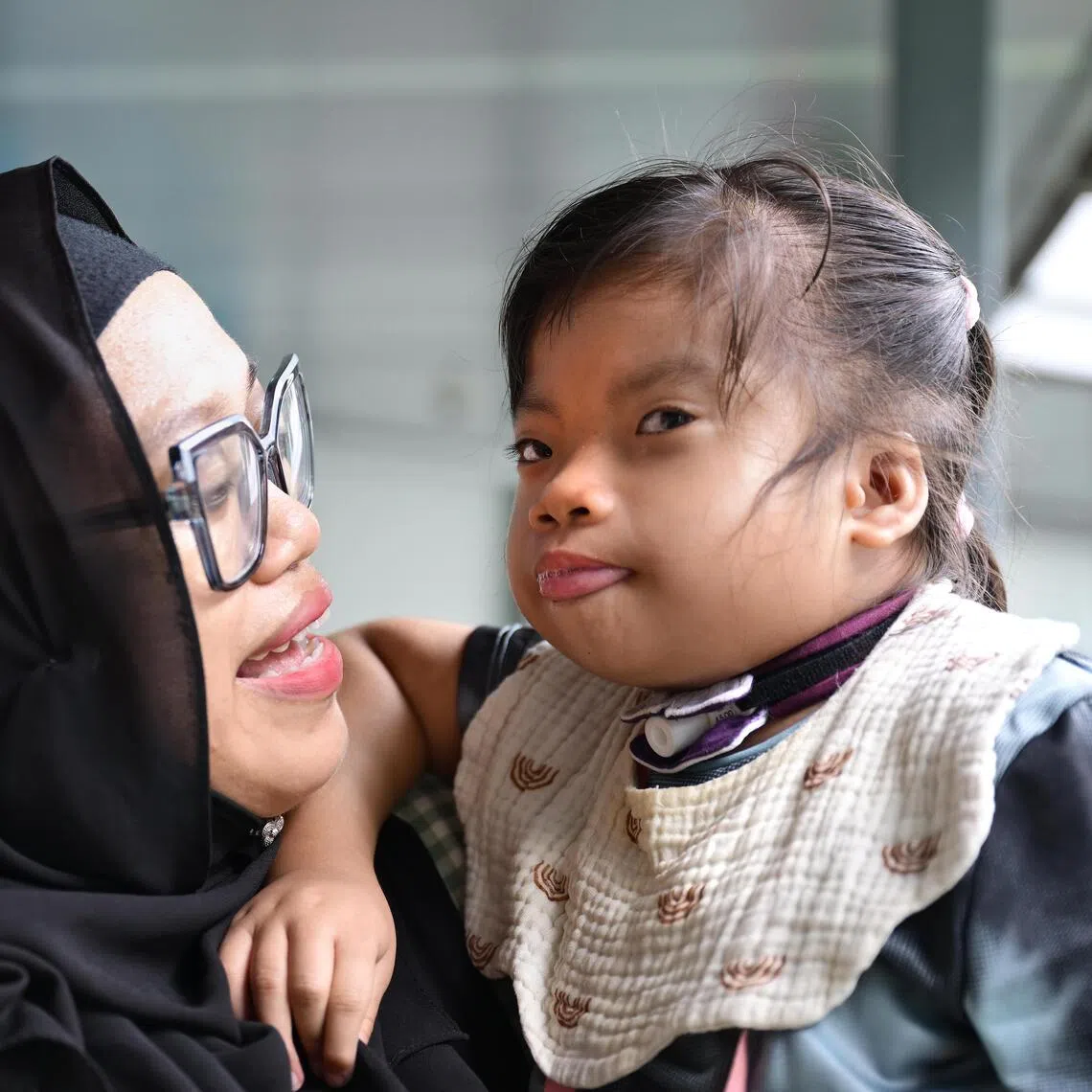 Rania Safiyya Ridzwan, five, has a rare genetic disorder called Kaufman oculocerebrofacial syndrome.