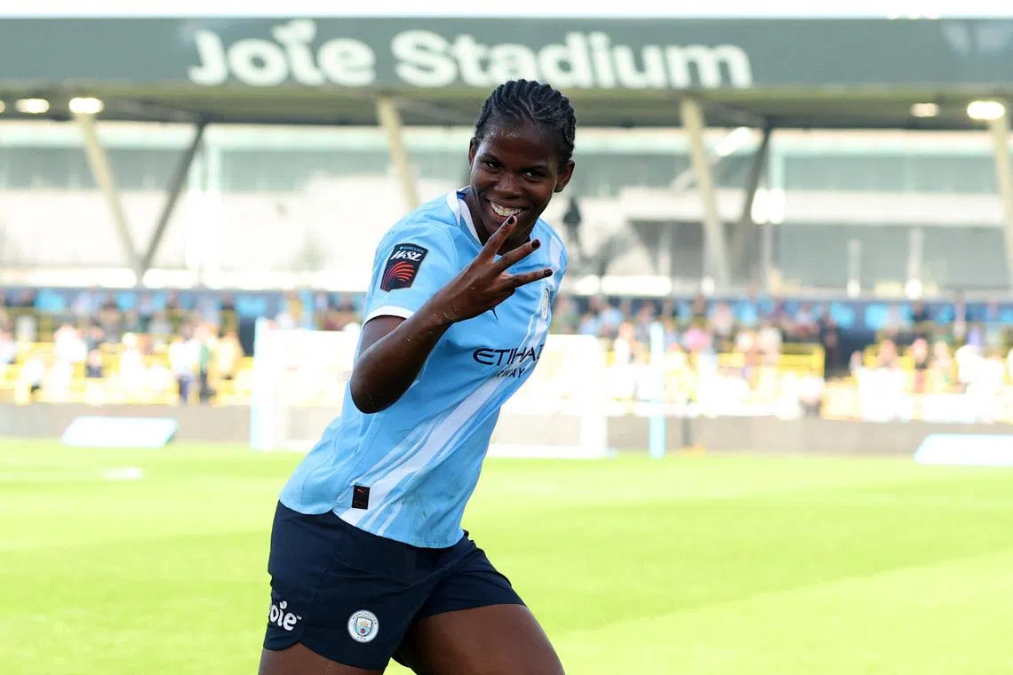 Soccer Football - Women's Super League - Manchester City v Tottenham Hotspur - Manchester City Academy Stadium, Manchester, Britain - March 21, 2026 Manchester City's Khadija Shaw celebrates scoring their third goal Action Images via Reuters/Craig Brough