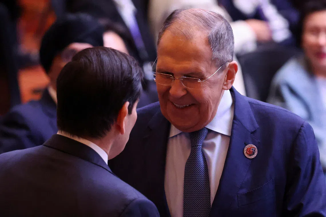 Russia's Foreign Minister Sergei Lavrov reacts as he talks to U.S. Secretary of State Marco Rubio during the 15th East Asia Summit Foreign Ministers' Meeting at the Convention Centre in Kuala Lumpur, Malaysia July 11, 2025. REUTERS/Hasnoor Hussain