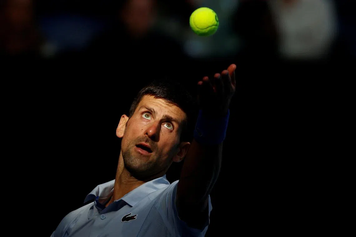 FILE PHOTO: Tennis - Australian Open - Melbourne Park, Melbourne, Australia - January 26, 2024 Serbia's Novak Djokovic in action during his semi final match against Italy's Jannik Sinner REUTERS/Ciro De Luca/File Photo
