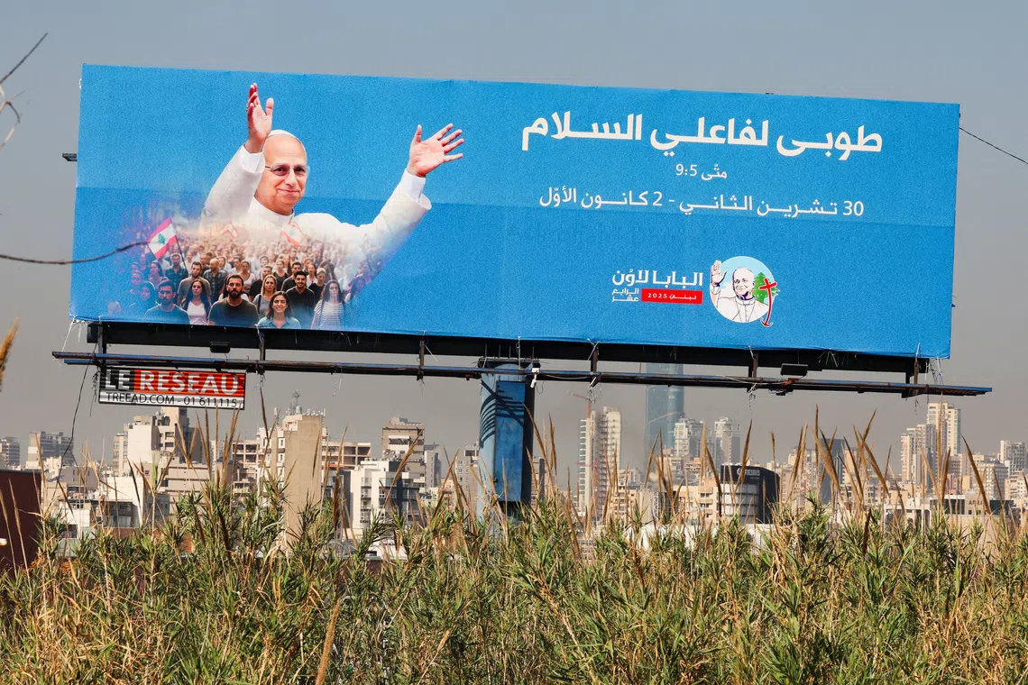 A billboard of Pope Leo XIV is placed along a road, ahead of his planned visit to Lebanon, in Hazmieh, Lebanon November 28, 2025. REUTERS/Mohamed Azakir