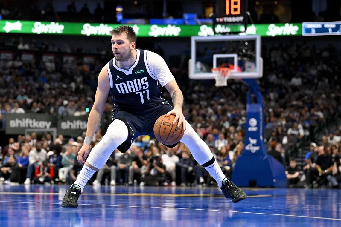 FILE PHOTO: Nov 19, 2024; Dallas, Texas, USA; Dallas Mavericks guard Luka Doncic (77) brings the ball up court against the New Orleans Pelicans during the second half at the American Airlines Center. Mandatory Credit: Jerome Miron-Imagn Images/File Photo