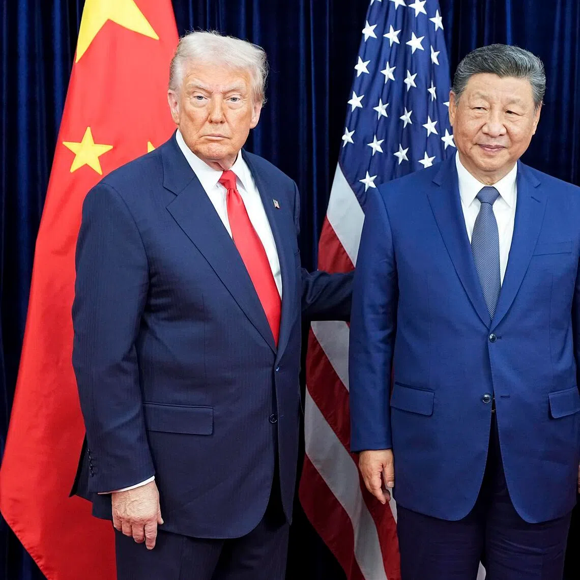 US President Donald Trump (left) meets with Chinese President Xi Jinping in Busan, South Korea, Oct 30, 2025. 