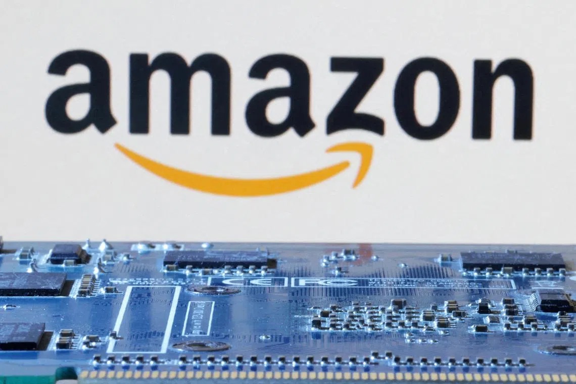 FILE PHOTO: Amazon logo is seen near computer motherboard in this illustration taken January 8, 2024. REUTERS/Dado Ruvic/Illustration/File Photo