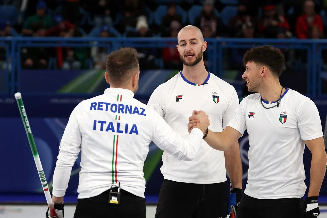 Curling-Italian men beat Britain, US women earn first win over Canada