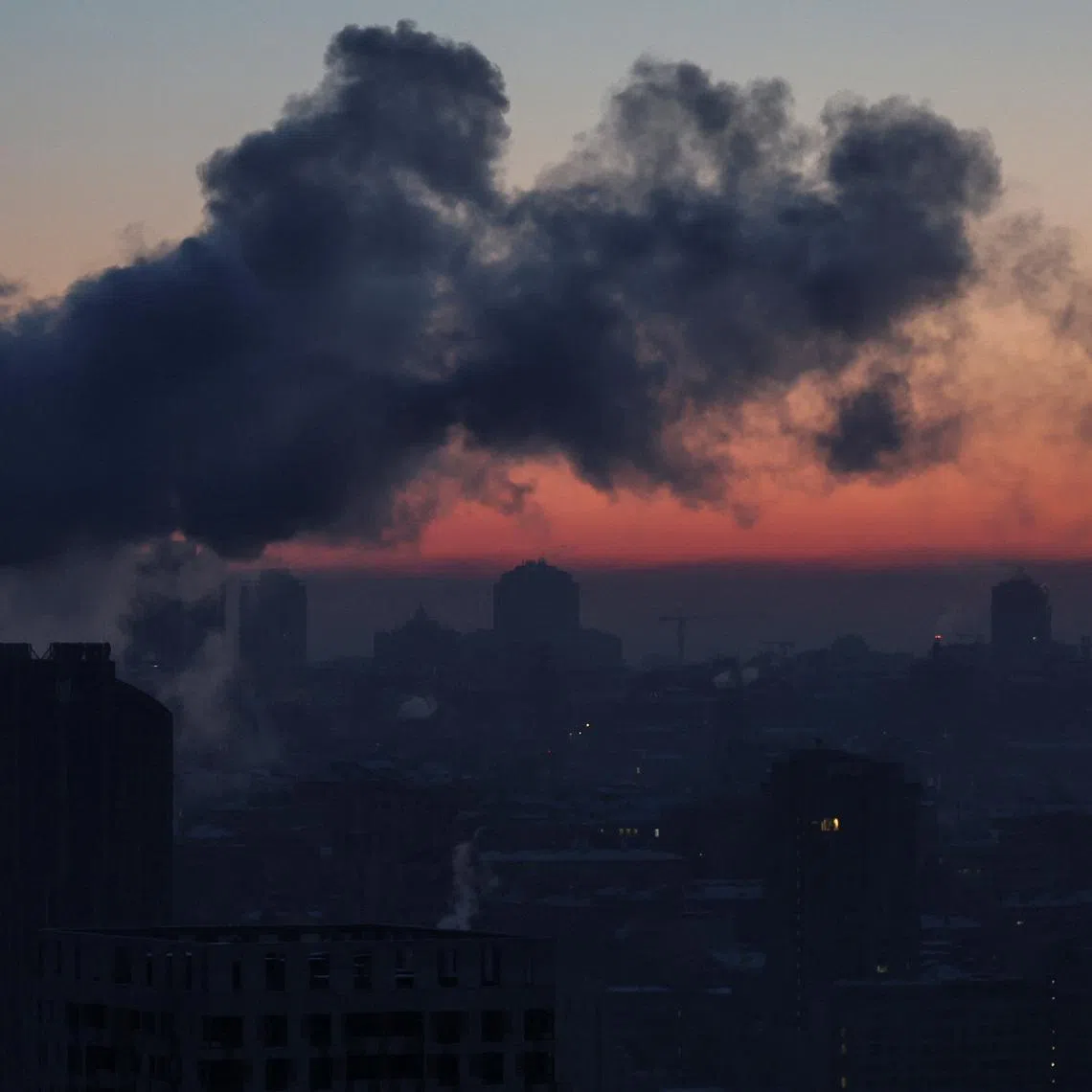 Water vapour rises from residential buildings' autonomous heating systems during a power blackout and freezing temperatures, after critical civil infrastructure was hit by recent Russian missile and drone attacks, amid Russia's attack on Ukraine, in Kyiv, Ukraine, February 3, 2026. REUTERS/Gleb Garanich