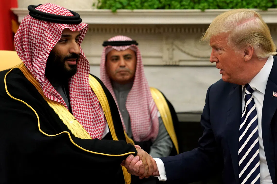 U.S. President Donald Trump shakes hands with Saudi Arabia's Crown Prince Mohammed bin Salman in the Oval Office at the White House in Washington, U.S. March 20, 2018.  REUTERS/Jonathan Ernst