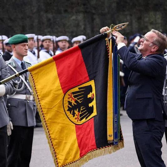 German Defence Minister Boris Pistorius, seen here visiting the Guard Battalion in Berlin on July 15, is in charge of a growing military.
