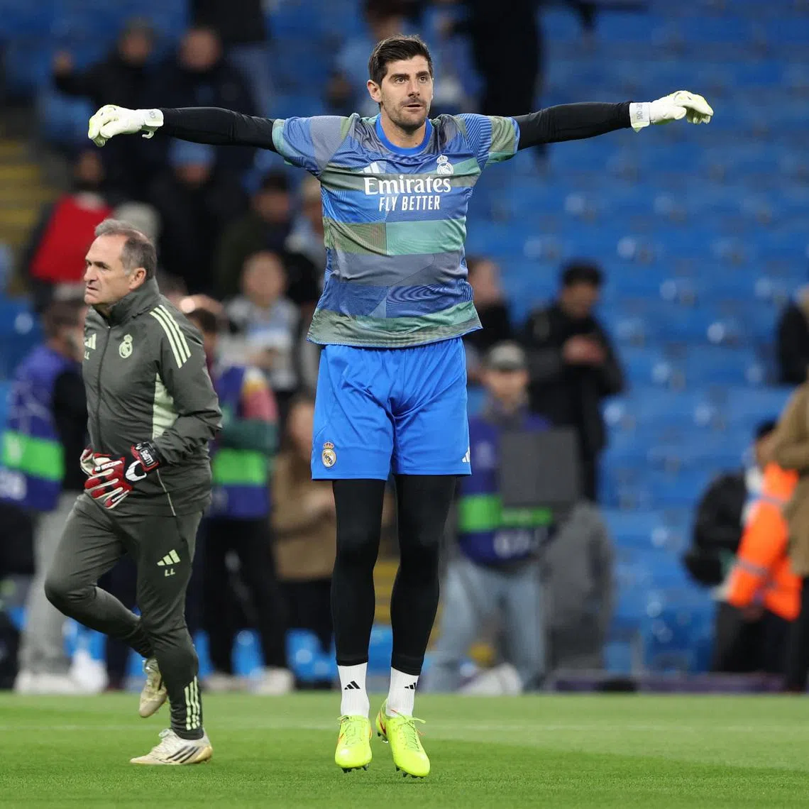 FILE PHOTO: Soccer Football - UEFA Champions League - Round 16 - Second Leg - Manchester City v Real Madrid - Etihad Stadium, Manchester, Britain - March 17, 2026 Real Madrid's Thibaut Courtois during the warm up before the match REUTERS/Scott Heppell/File Photo