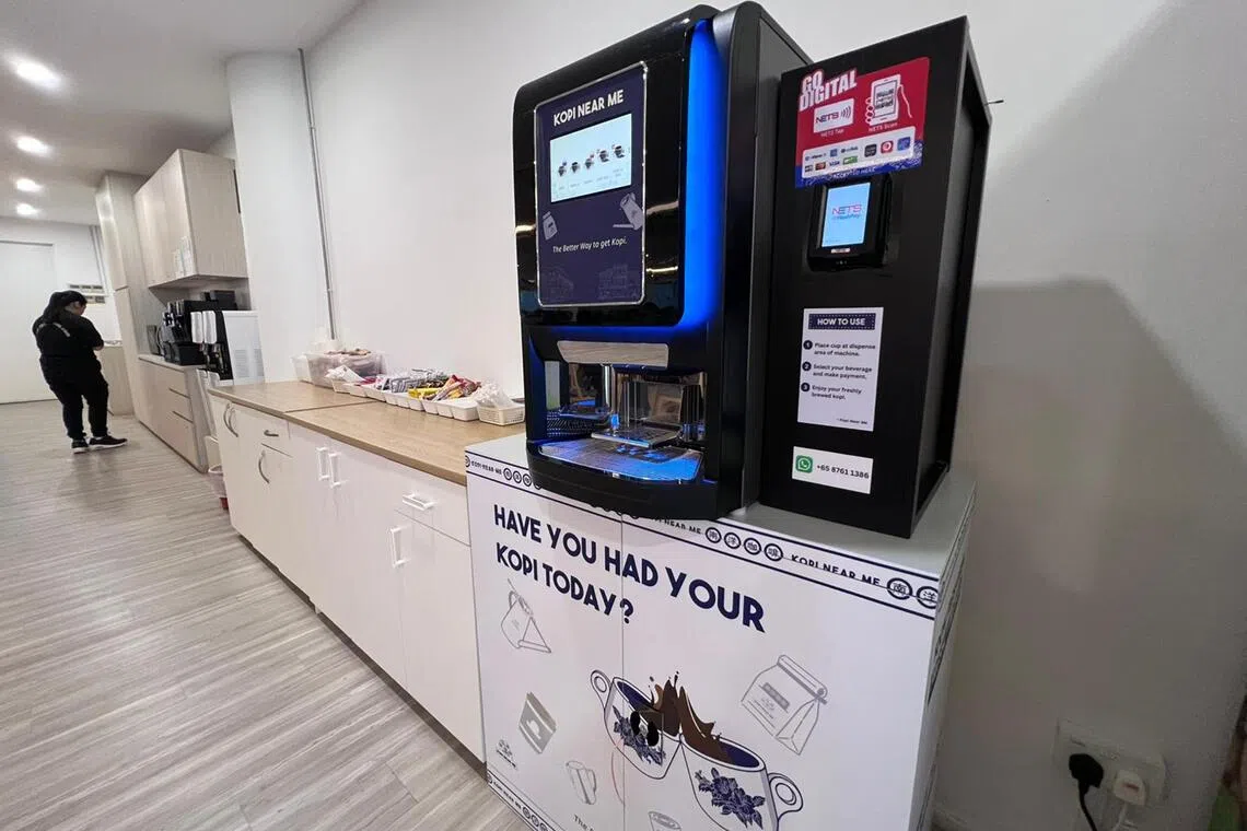 A tabletop-sized machine in an office pantry from by Singapore start-up Kopi Near Me that can freshly brew Nanyang-style coffee.