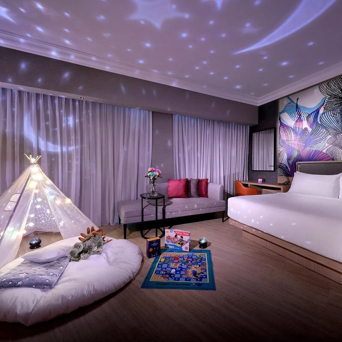 Grand Copthorne Waterfront Hotel Singapore's ‘Glamping Under the Stars Experience’ has an indoor camping setup complete with a children’s tent.