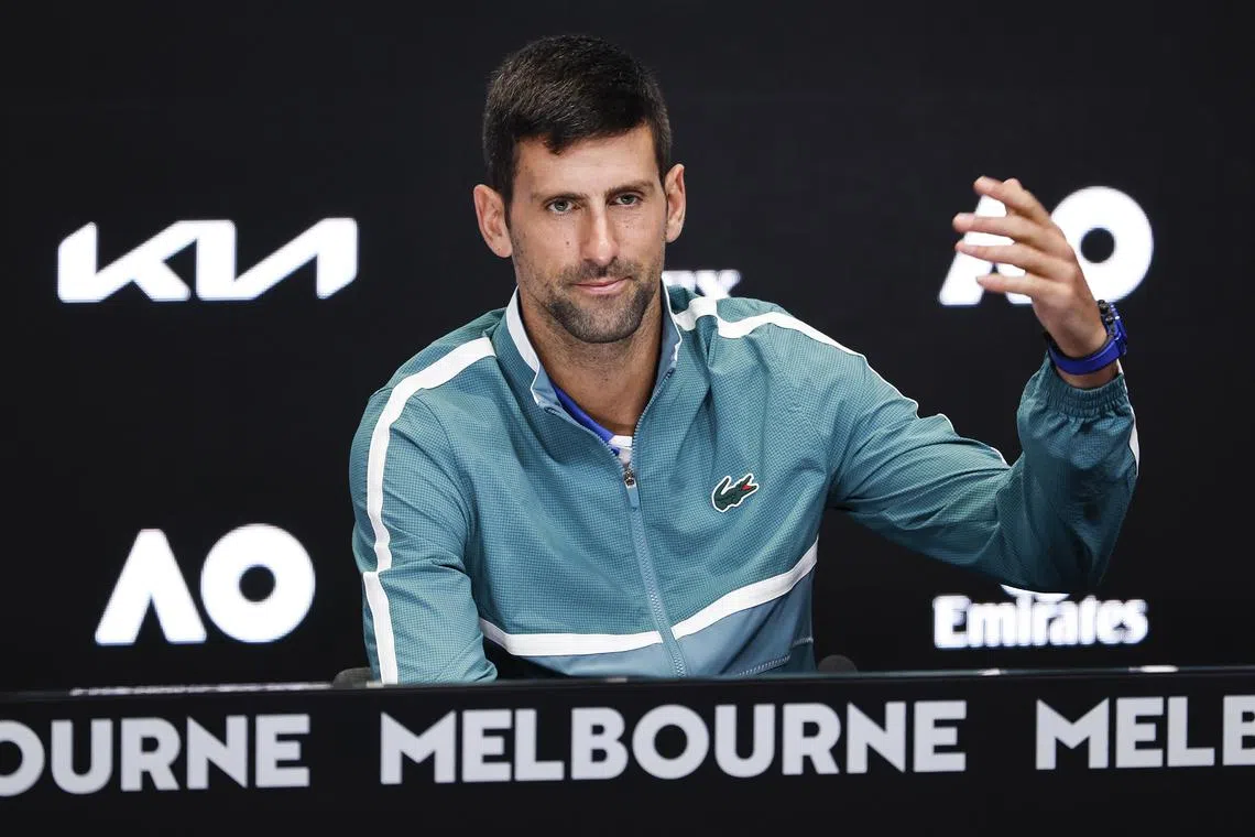 Serbia's Novak Djokovic takes reporters' questions at a press conference ahead of the Australian Open.