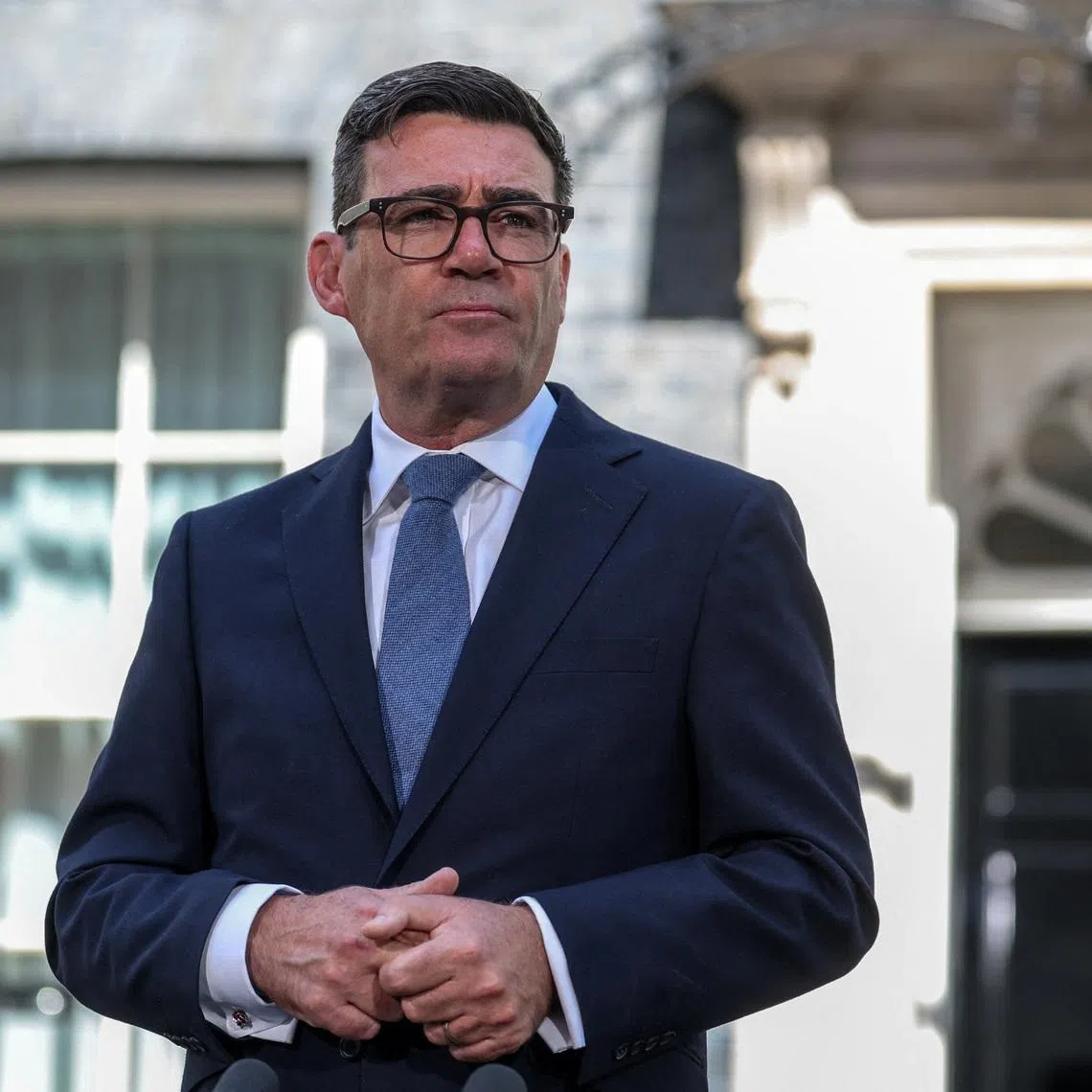 Britain's newly appointed Prime Minister Andy Burnham looks on as he delivers a speech outside 10 Downing Street after taking office, in London, Britain, July 20, 2026. REUTERS/Isabel Infantes