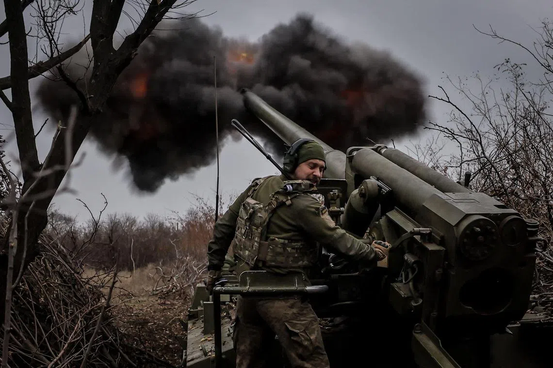 A Ukrainian serviceman firing a self-propelled howitzer towards Russian positions near Chasiv Yar, in Ukraine's Donetsk region, in November 2024.