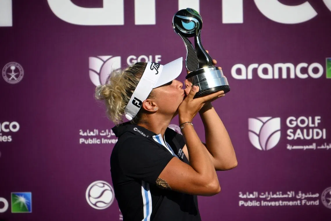 Pauline Roussin with her trophy after winning the individual event at the Aramco Team Series - Singapore on March 17, 2023. 