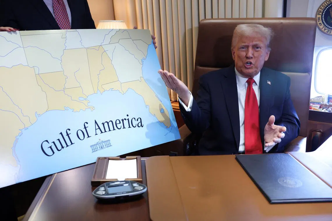 U.S. President Donald Trump speaks to reporters after signing a proclamation renaming the Gulf of Mexico to the Gulf of America, while flying over the gulf aboard Air Force One en route to New Orleans to attend the Super Bowl, February 9,  2025. REUTERS/Kevin Lamarque/File Photo