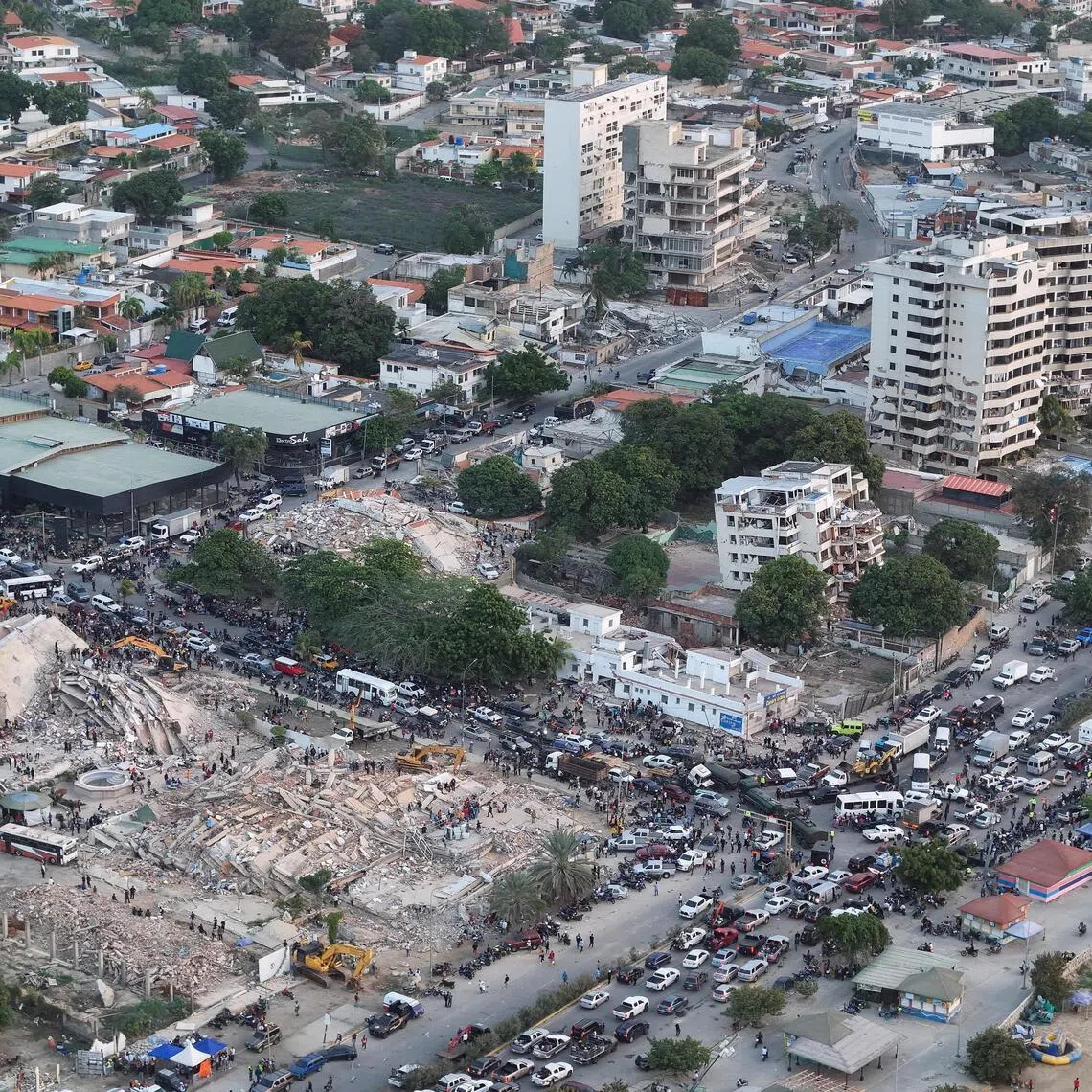 A drone view showing buildings destroyed by earthquakes, in La Guaira, Venezuela, on June 26.