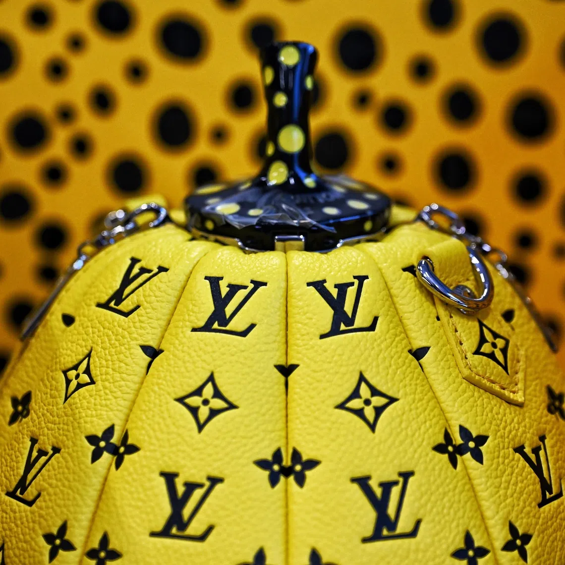 A limited edition Louis Vuitton pumpkin bag - a collaboration with Japanese artist Yayoi Kusama - attracted 81 bids, the most of any item.