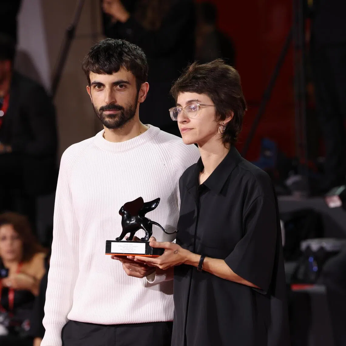 Israeli filmmakers Yuval Abraham (left) and Rachel Szor with their special jury prize for the documentary NAZA, at the Venice Film Festival in September 2026.