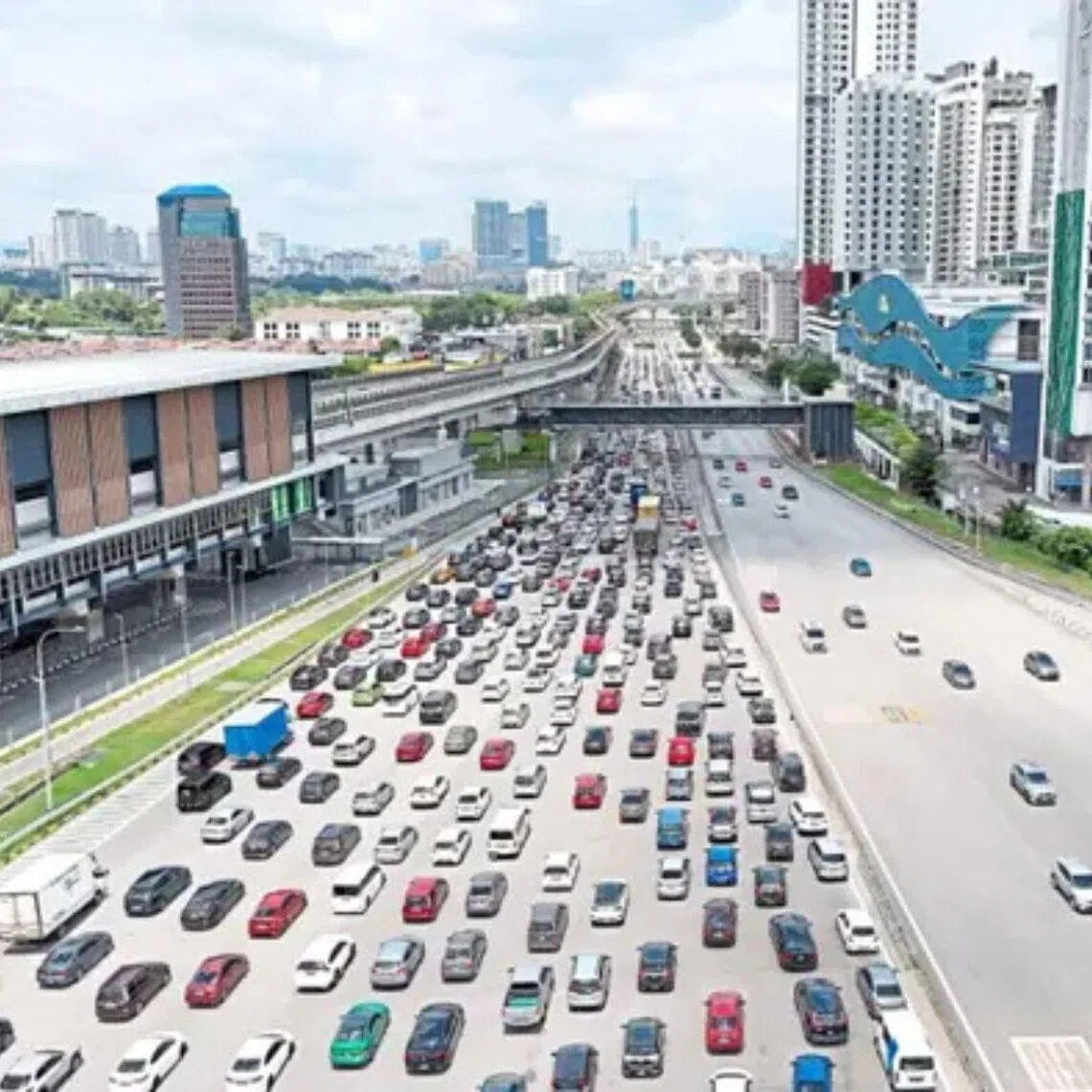 Traffic at the Sungei Besi Toll Plaza towards Kuala Lumpur, at 1.30pm on Feb 14.