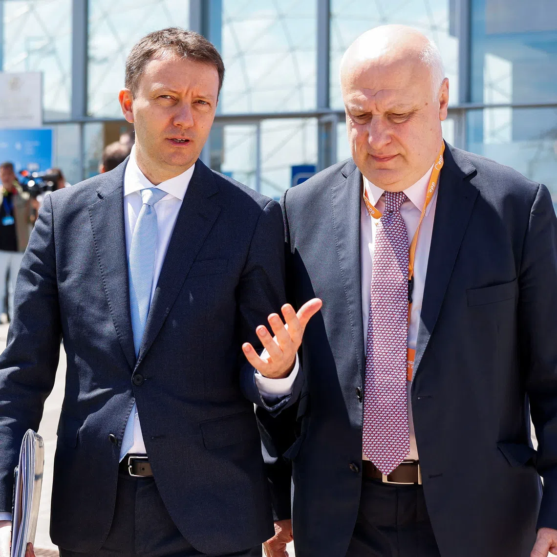 FILE PHOTO: European People's Party (EPP) vice-president Siegfried Muresan and former OSCE Parliamentary Assembly President Giorgi Tsereteli walk on the day of the European People's Party (EPP) congress, in Valencia, Spain April 29, 2025. REUTERS/Eva Manez/File Photo