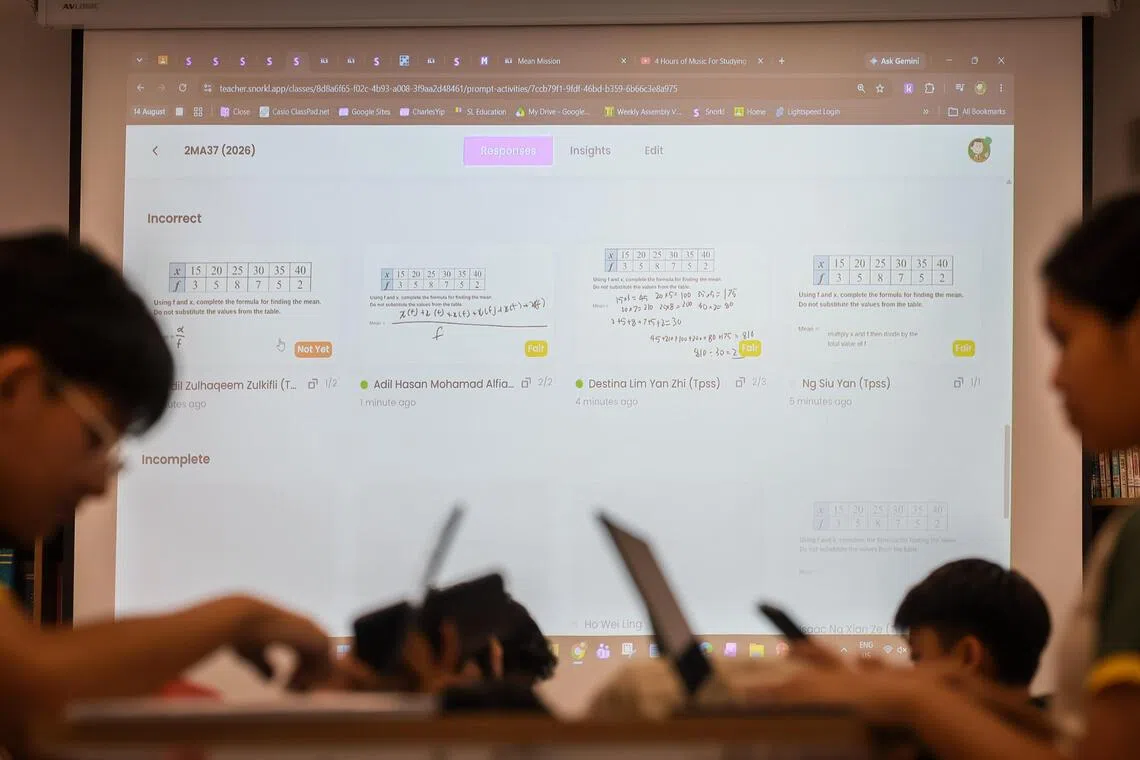 Students use the Snorkl during a mathematics lesson at Tampines Secondary School.